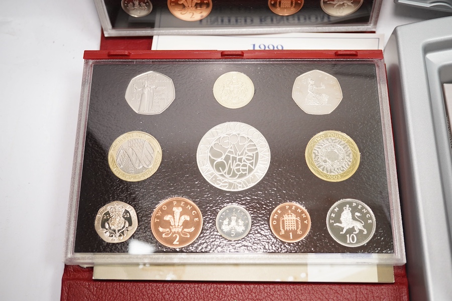 British coins, QEII, Royal Mint, seven UK proof coins sets, deluxe 1997-1999 and 2001-2003 and executive 2000